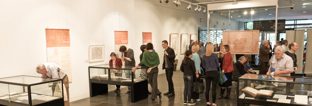 People enjoying an exhibition at PROV People enjoying an exhibition at PROV