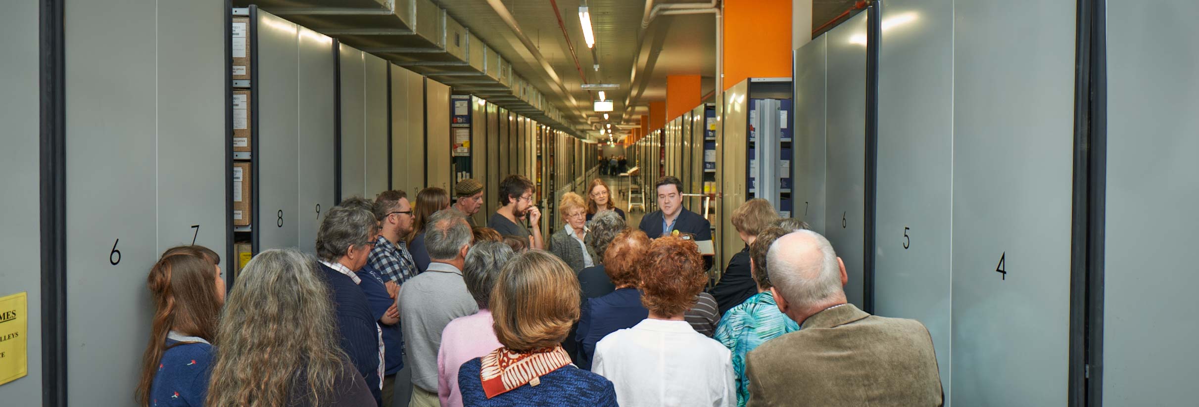 A group on a tour of the repository An image of a tour at PROV