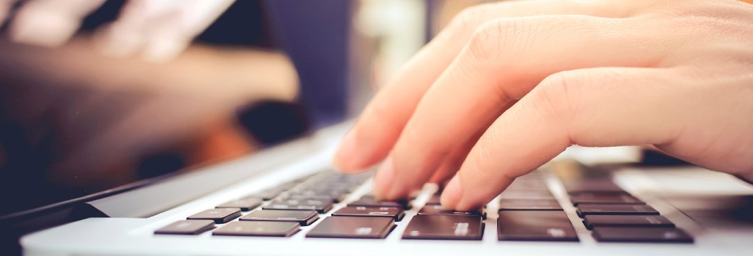 Stock Image typing on keyboard