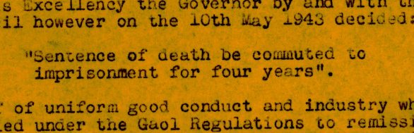 orange paper with type writer text saying sentence of death to be commuted to imprisonment for four years.