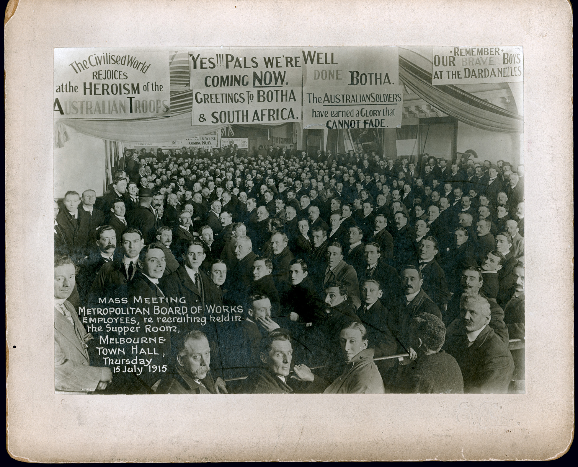 Black and white photograph of World War I recruiting meeting.